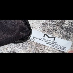 Maiden form shaping body suit.